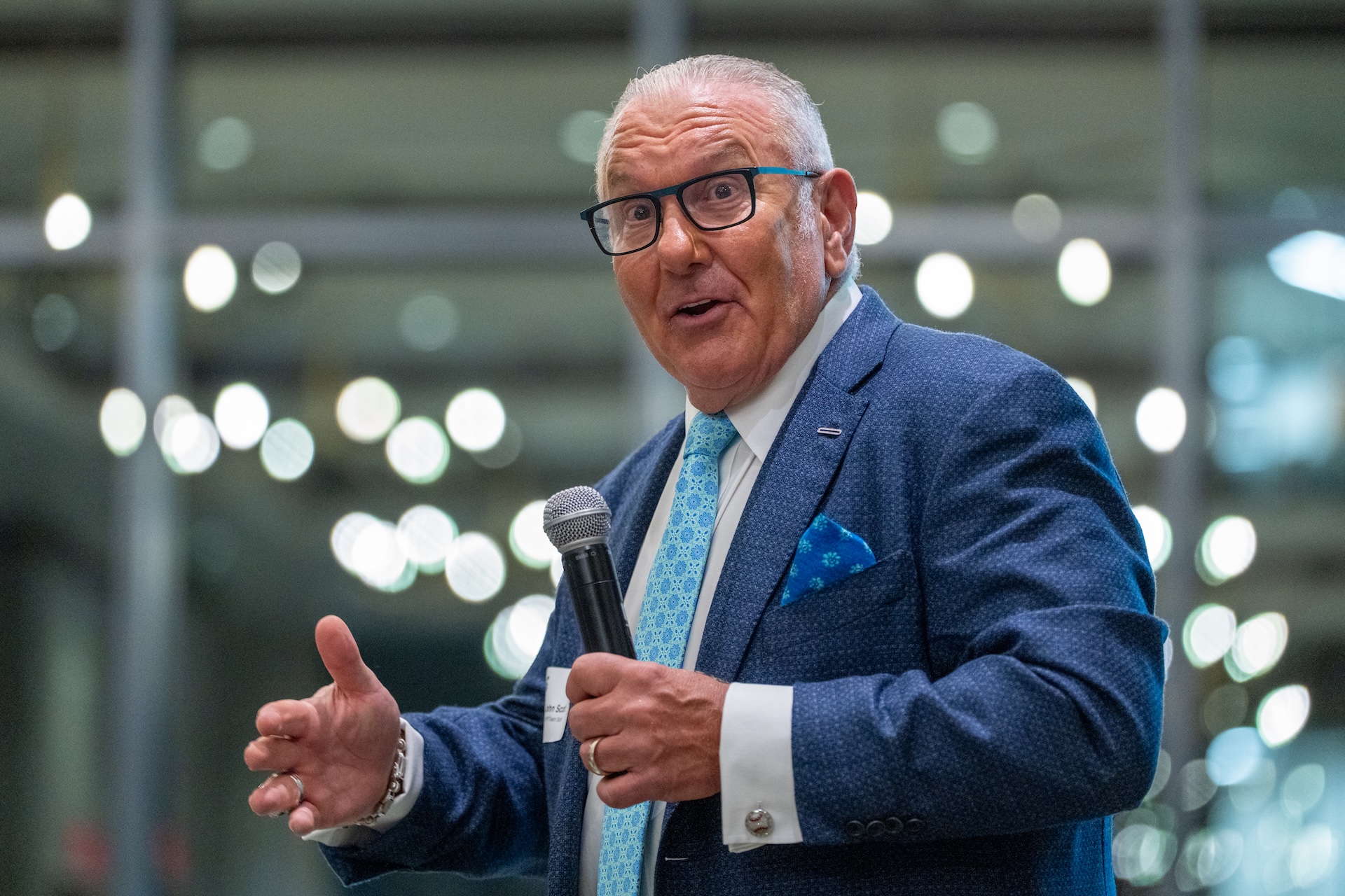 Picture of John Scotti presenting at the 2025 Simon Lecture.